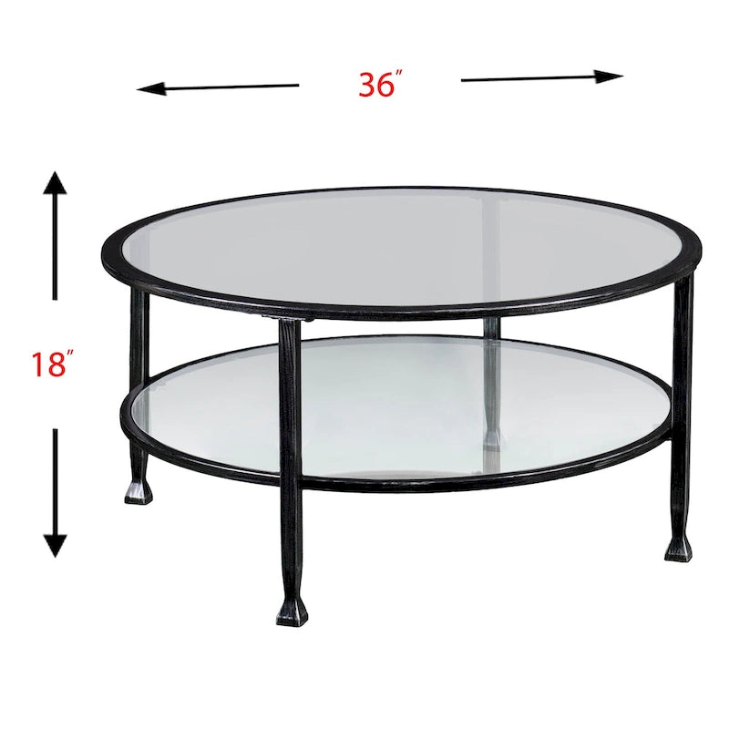 SEI Furniture Glenn Distressed Black Metal Round CoffeeTable with Glass Top and Shelf